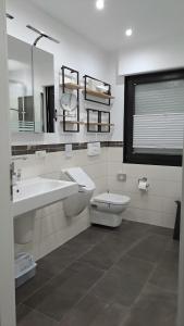 Phòng tắm tại Ferienhaus Am Rarbach, 140qm