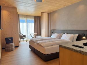 Postel nebo postele na pokoji v ubytování Hotel Damelis