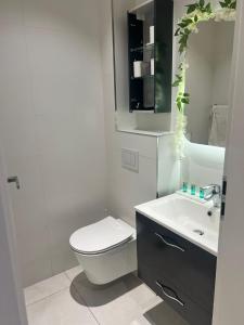 Koupelna v ubytování UpartHotel