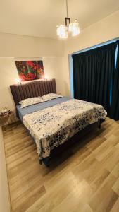 Postel nebo postele na pokoji v ubytování CHIC Apartment Piata Constitutiei - near the Palace of Parliament