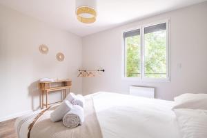 Postel nebo postele na pokoji v ubytování La Terrasse du Buchet