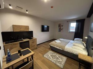 Μια τηλεόραση ή/και κέντρο ψυχαγωγίας στο K2 Loft apartHotel