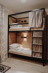 Postel nebo postele na pokoji v ubytování People Nest