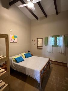 Ένα ή περισσότερα κρεβάτια σε δωμάτιο στο La Maguada