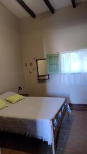 Ένα ή περισσότερα κρεβάτια σε δωμάτιο στο La Maguada +2 φωτογραφίες