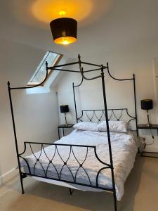 Postel nebo postele na pokoji v ubytování Brylach Steading