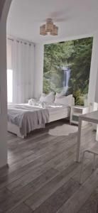 Postel nebo postele na pokoji v ubytování Pensjonat Magdalena - w cichym i spokojnym miejscu - zwierzęta akceptowane, bezpłatny parking