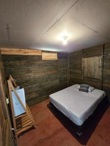 Postel nebo postele na pokoji v ubytování Rustik Cabaña