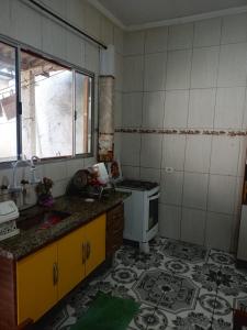 Køkken eller tekøkken på Cantinho do aconchego + 5 billeder