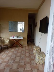 Et tv og/eller underholdning på Cantinho do aconchego