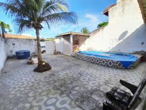 Swimmingpoolen hos eller tæt på Casa em Açu da Torre a 500m de Praia do Forte