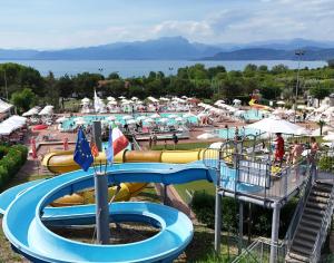 a water park with a water slide and a water park at Camping Park delle Rose in Lazise