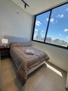 Postel nebo postele na pokoji v ubytování Edificio Torre Firenze Majestuoso + 8 fotografií