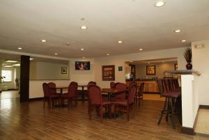 a dining room with a table and chairs at Expo Inn in Tulsa