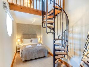 En eller flere senge i et værelse på Cheshire Barns