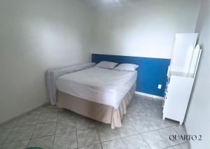 Postel nebo postele na pokoji v ubytování Casa FRENTE MAR Anchieta c/piscina e Área Goumert