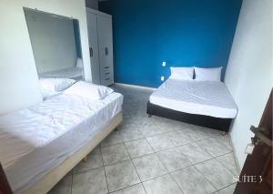 Postel nebo postele na pokoji v ubytování Casa FRENTE MAR Anchieta c/piscina e Área Goumert + 32 fotografií