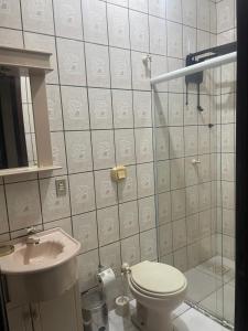 Ένα μπάνιο στο Casa de Praia Navegantes - 100 metros do mar +4 φωτογραφίες