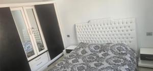 Postel nebo postele na pokoji v ubytování Residence fedi