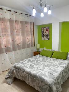 En eller flere senge i et værelse på city mazarron