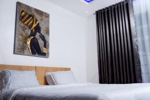 Postel nebo postele na pokoji v ubytování GoodHouse Rhythm and Blues + 6 fotografií