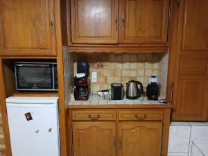 Kuchyň nebo kuchyňský kout v ubytování Escale de Cravant