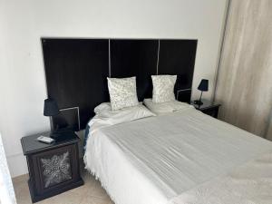 En eller flere senge i et værelse på Amplia Casa - Vista Verde + 15 billeder