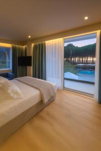 Postel nebo postele na pokoji v ubytování Vila Eva