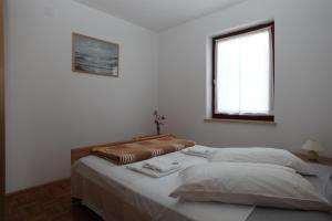 Ένα ή περισσότερα κρεβάτια σε δωμάτιο στο Apartments Duomo