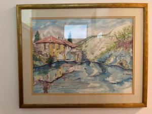 a painting of a painting of a house on a lake at Fenix Mostar in Mostar