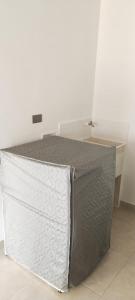 En eller flere senge i et værelse på Apartaestudio corregimiento la virginia- Calarca