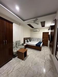 Ένα ή περισσότερα κρεβάτια σε δωμάτιο στο Hotel Moon Stone