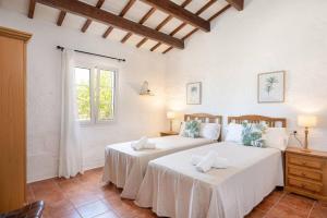 Ένα ή περισσότερα κρεβάτια σε δωμάτιο στο FINCA SON GRAS +19 φωτογραφίες