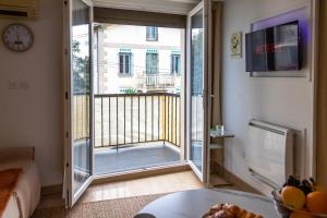 Balkón nebo terasa v ubytování La Demeure du Soleil T2 cosy, Clim,Wifi, Castillet 15 min, parking facile