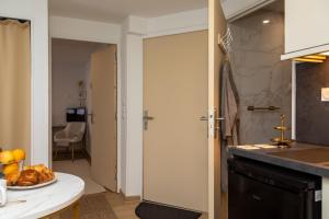 Fotografie z fotogalerie ubytování La Demeure du Soleil T2 cosy, Clim,Wifi, Castillet 15 min, parking facile v destinaci Perpignan + 42 fotografií