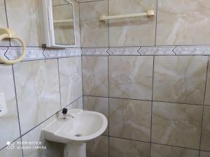 Koupelna v ubytování House in Balneário Atlântico half a block from the sea + 16 fotografií