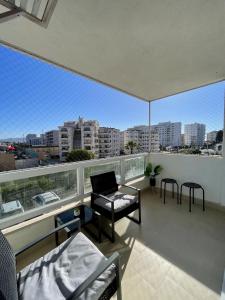 En balkon eller terrasse på Depto 2D 2B cercano a la playa