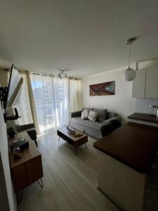 En eller flere senge i et værelse på Depto 2D 2B cercano a la playa + 6 billeder