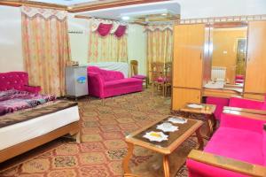 Posezení v ubytování Hotel Ambassador