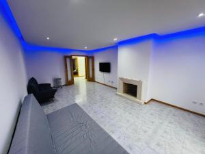 TV a/nebo společenská místnost v ubytování Moinho do vento