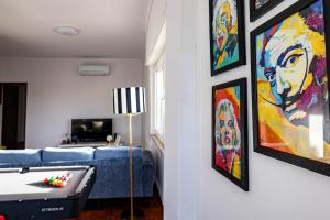 Giường trong phòng chung tại Ambassador's Retreat