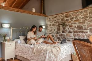 Giường trong phòng chung tại Carbayu Senda del Oso