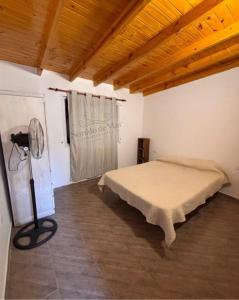 En eller flere senge i et værelse på Sonido de mar 2