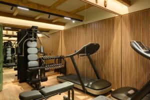 a room with a gym with a treadmill at Franz Apartments in Ilirska Bistrica