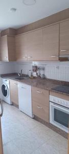 Kuchyň nebo kuchyňský kout v ubytování Apartalux San Pedro Playa