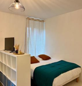 Postel nebo postele na pokoji v ubytování Escale Océane T1 calme 5 min à pied de la mer