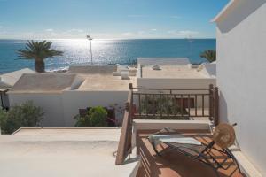 a view of the ocean from the balcony of a house at Lanzahost Casa Campagnolo in Playa Honda