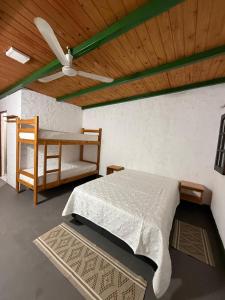 Postel nebo postele na pokoji v ubytování El Cacique Host