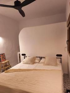 En eller flere senge i et værelse på Casa Abadía Boutique Stay