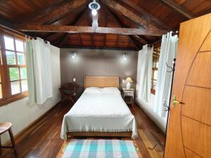 Postel nebo postele na pokoji v ubytování Recanto do Sitio + 16 fotografií